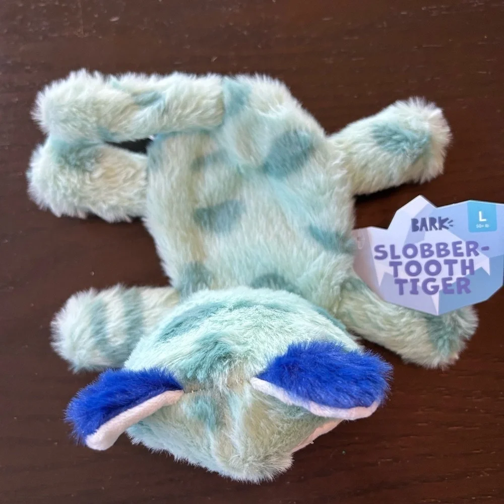 Blue and White Dog Toy with Soft Fuzzy Texture and Angry Expression